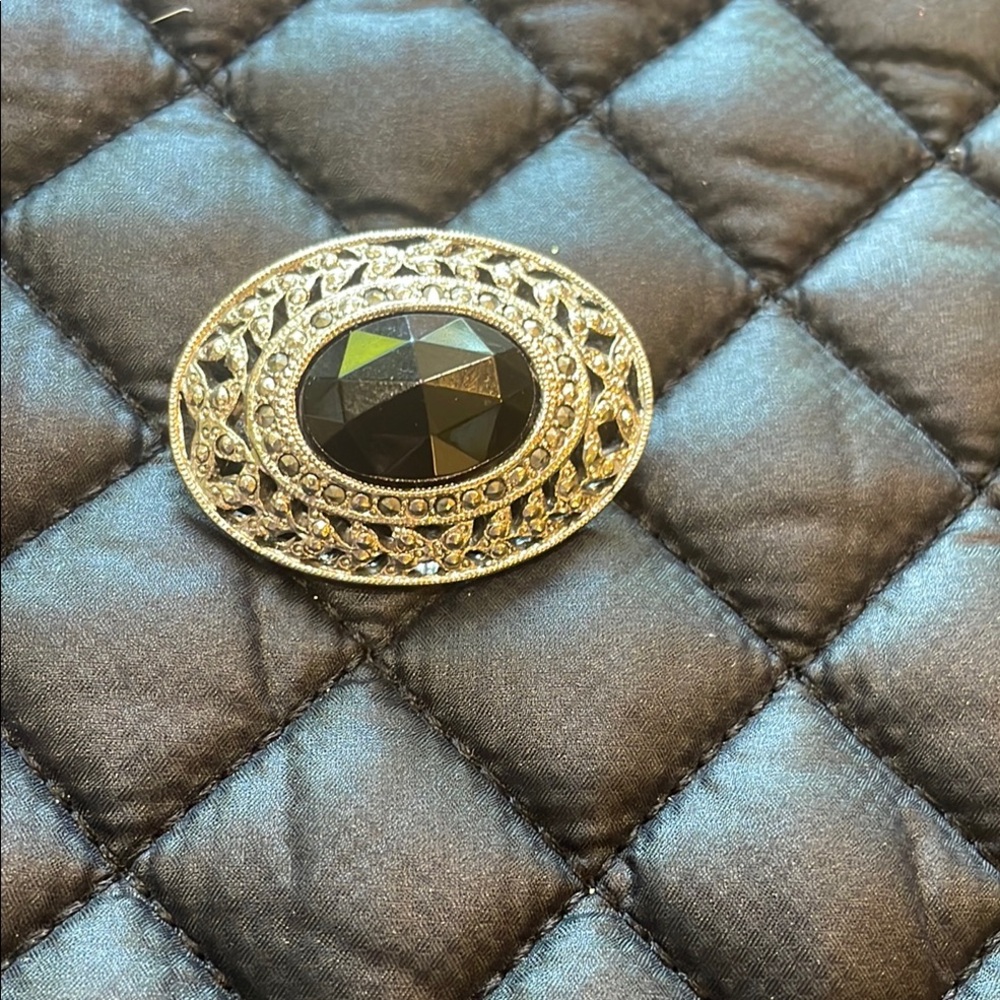 Elegant Black and Silver Brooch